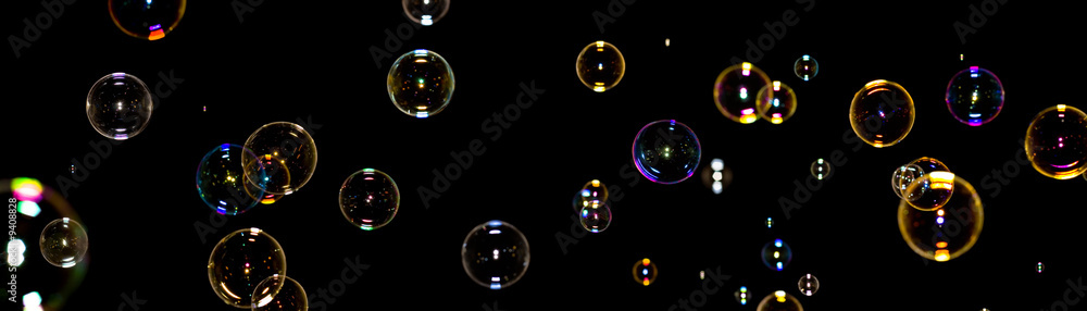 Color soap bubbles on black