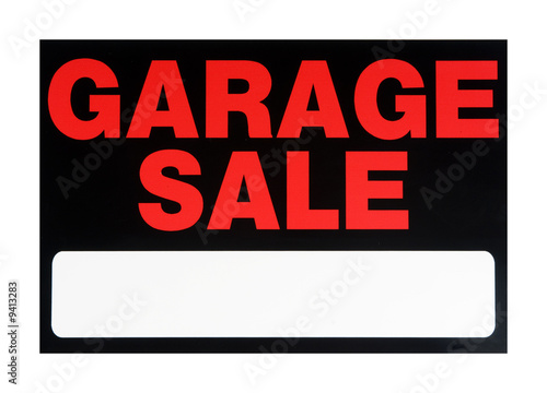 A bright red and black garage sale sign. isolated on white.