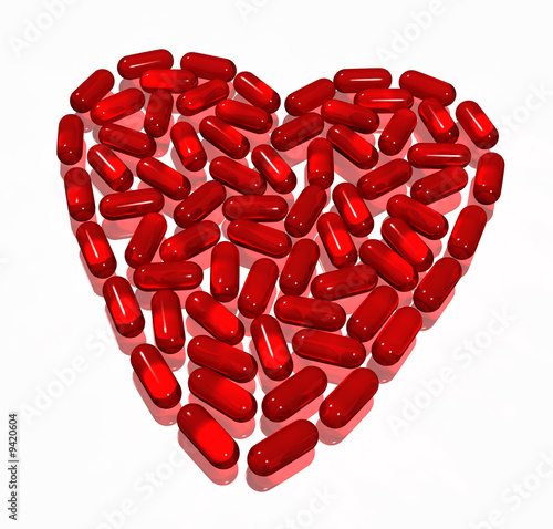 red transparent hearth of capsules on white