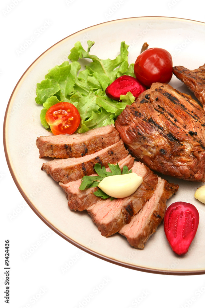 served roasted beef meat steak on color dish served roasted beef meat steak on color dish