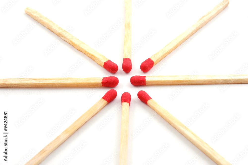 Some red matches isolated on a white background. Some red matches isolated on a white background.