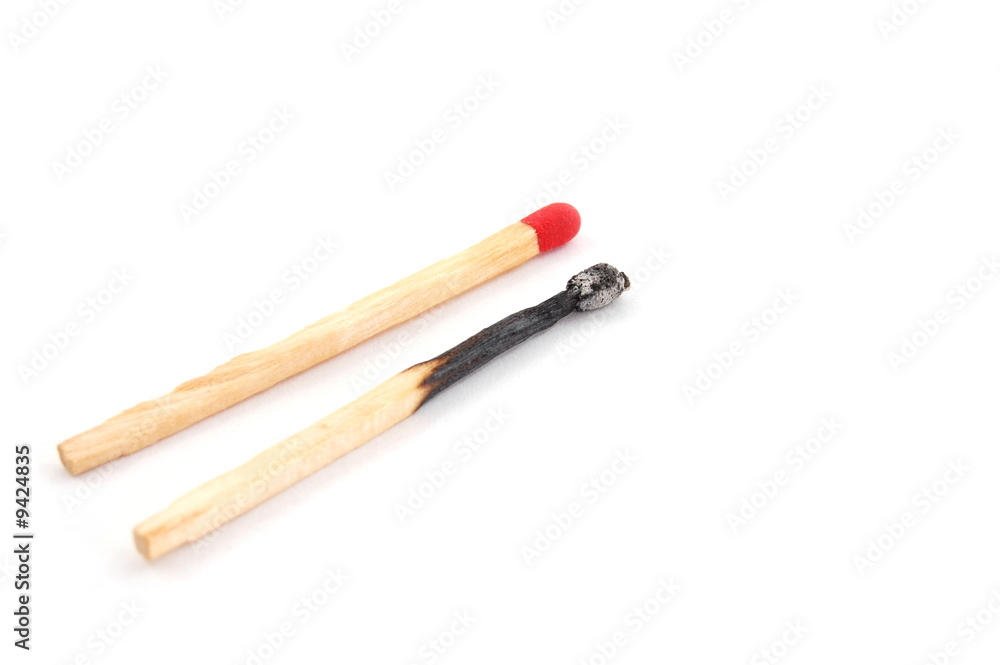 Some red matches isolated on a white background. Some red matches isolated on a white background.