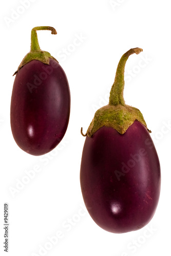ripe small eggplant expressed on white background