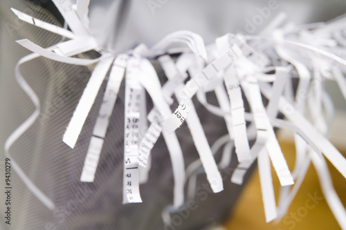 Close-Up Of An Overflowing Paper Shredder