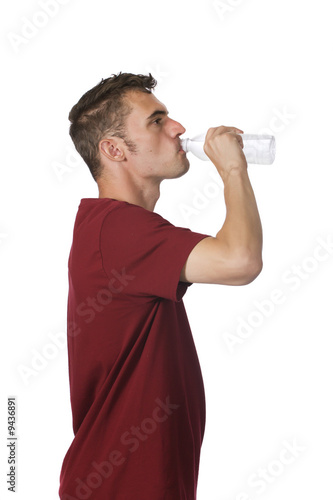 man drinking from water bottle