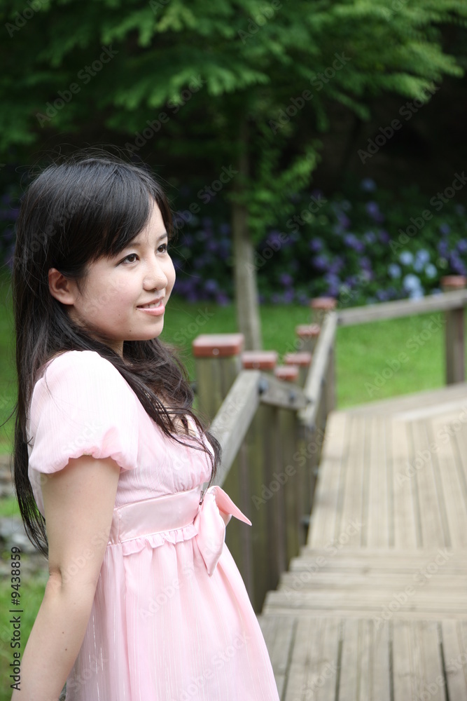 young woman on the boardwalk