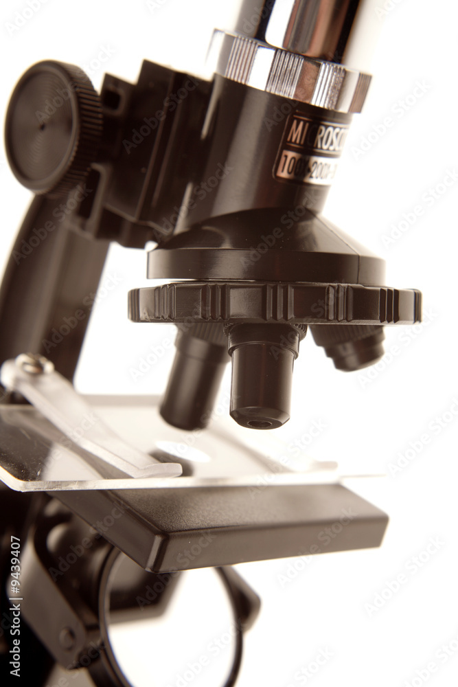 Microscope closeup over white background Microscope closeup over white background