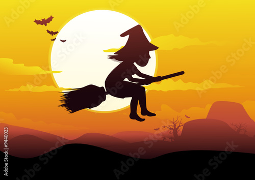 Ombre de sorcière dans le ciel orange
