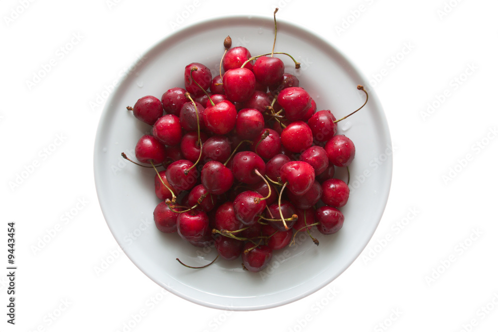 sweet cherries on porcelain plate isolated on white sweet cherries on porcelain plate isolated on white