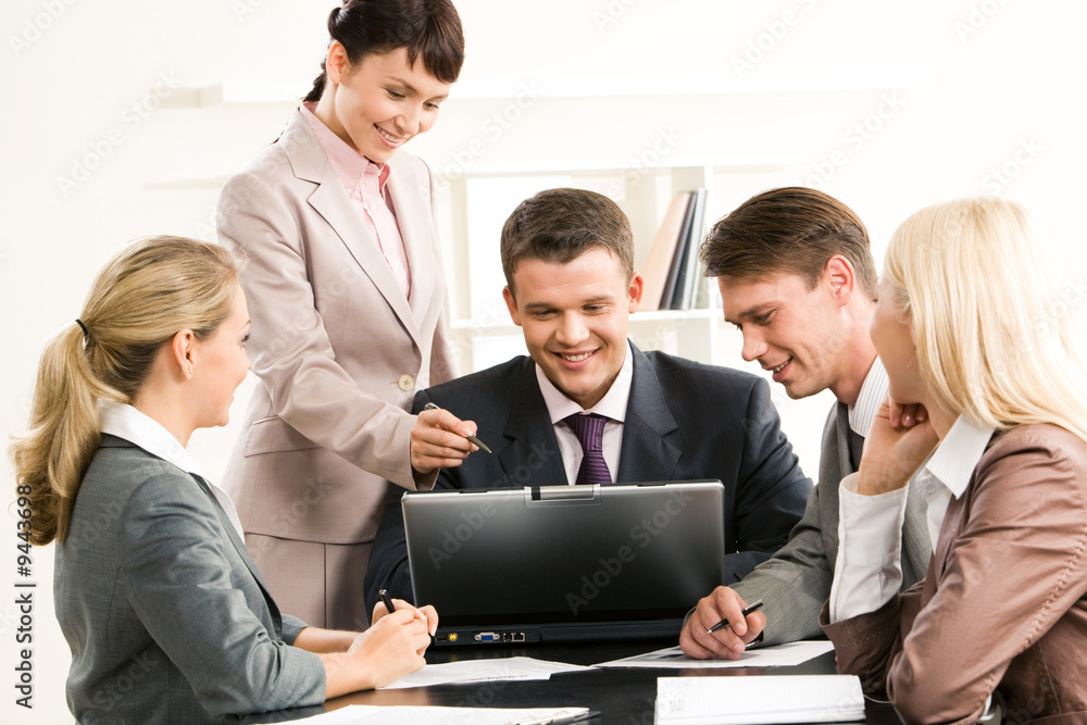 Portrait of friendly group sitting at table Portrait of friendly group sitting at table