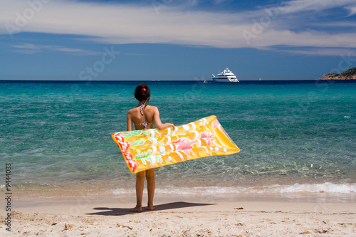 Young girl watching the sea