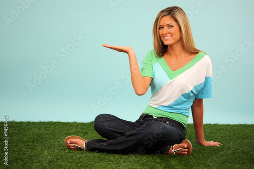 Woman Sitting In The Grass ...