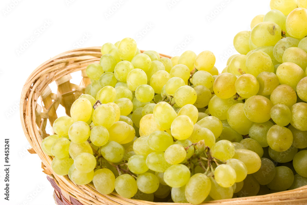 Fresh appetizing grapes on a white background