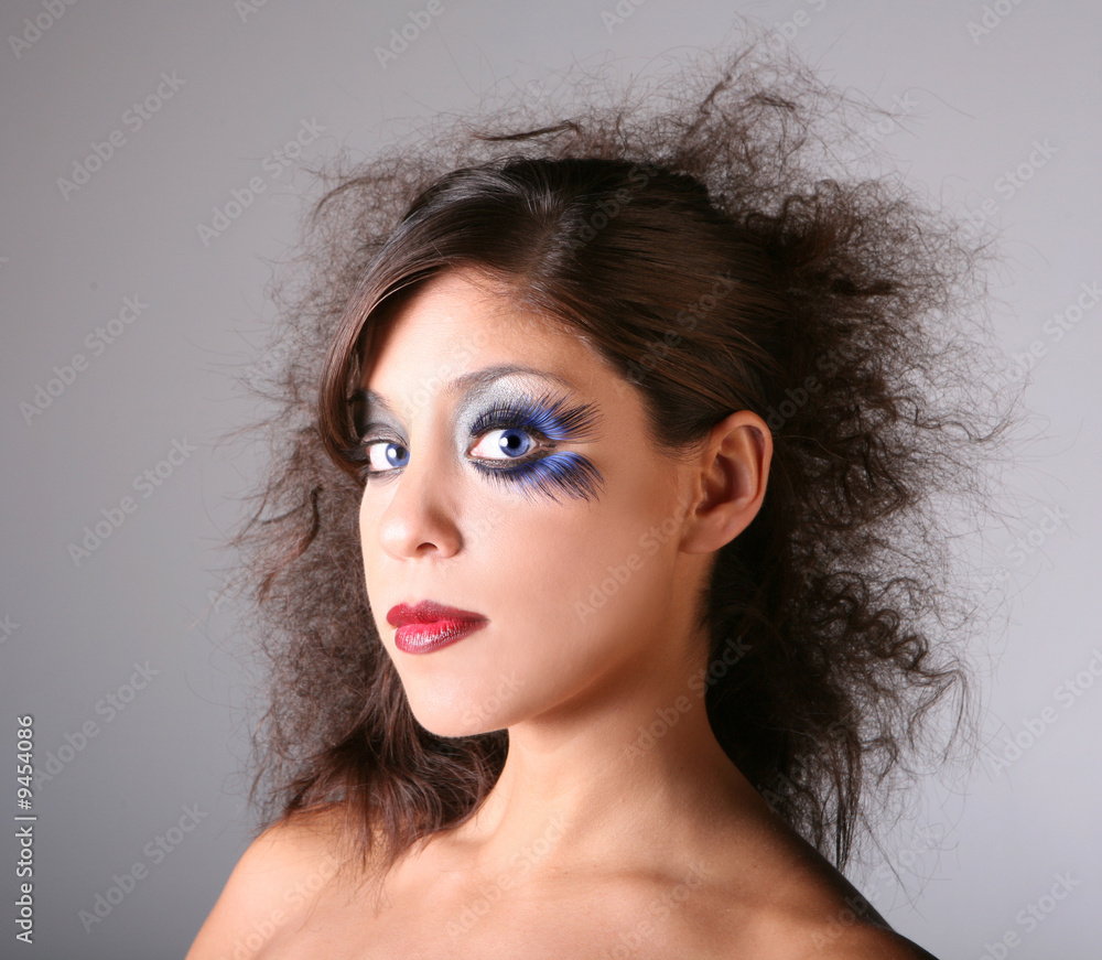 Artistic Glamour Stage Makeup On A Blue