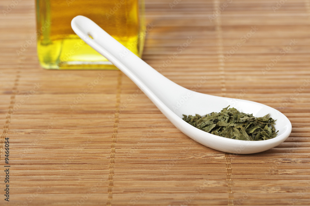 Parsley and oil with soft shadow in background. Shallow DOF Parsley and oil with soft shadow in background. Shallow DOF