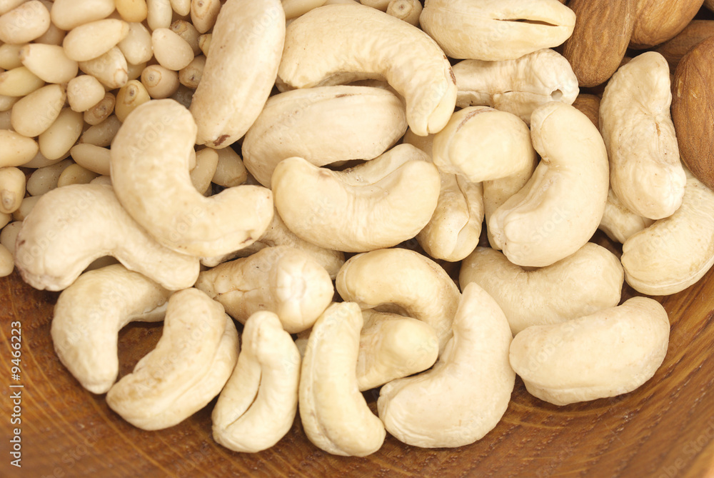 Pine nuts (cedar), cashew close-up Pine nuts (cedar), cashew close-up