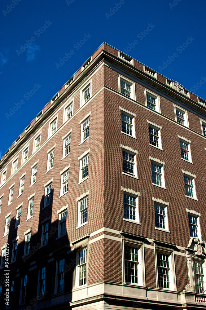 federal style brick building in the beacon hill area of boston
