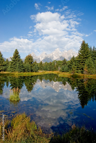 Fototapeta Naklejka Na Ścianę i Meble -  Reflections in water of the Grand Tetons park