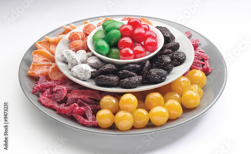 Schilderij op canvas colourful sweet and sour titbit snack on dish