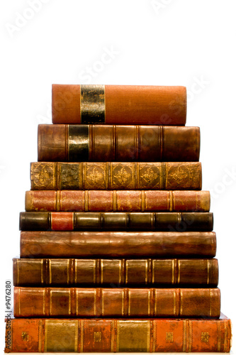 A row of antique leather books isolated on a white background