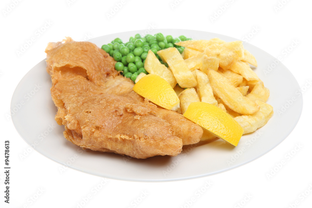Traditional deep-fried cod with chips and peas Traditional deep-fried cod with chips and peas