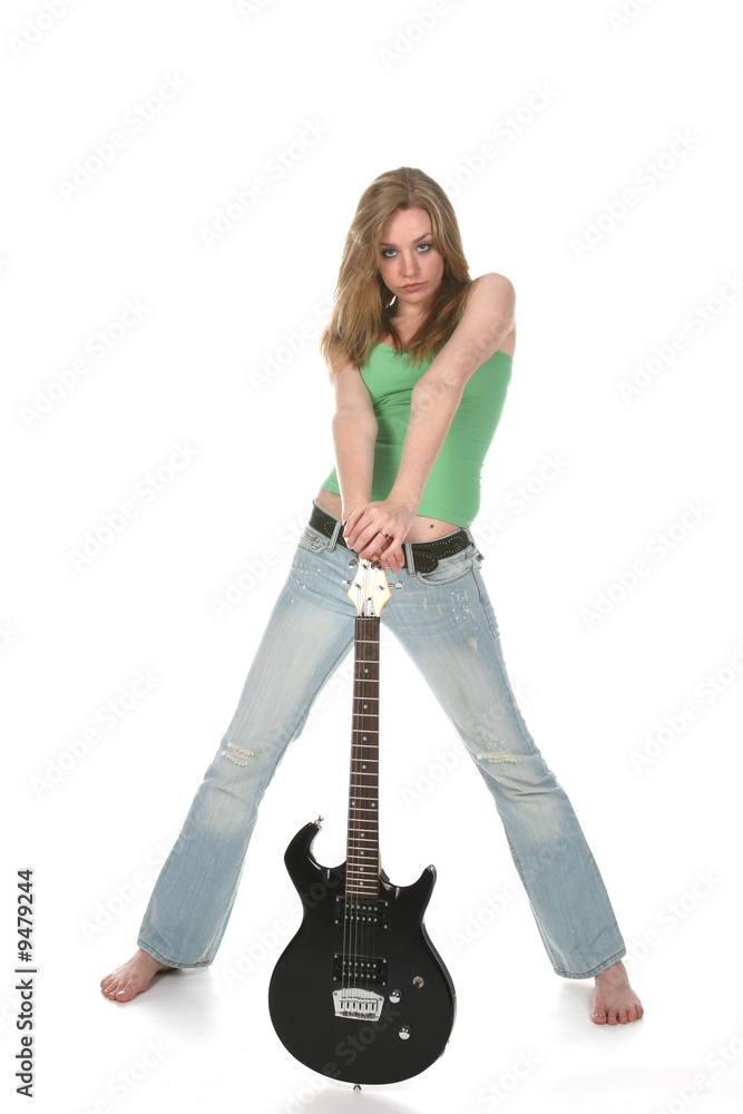 portrait of sexy sultry woman with black electric guitar portrait of sexy sultry woman with black electric guitar