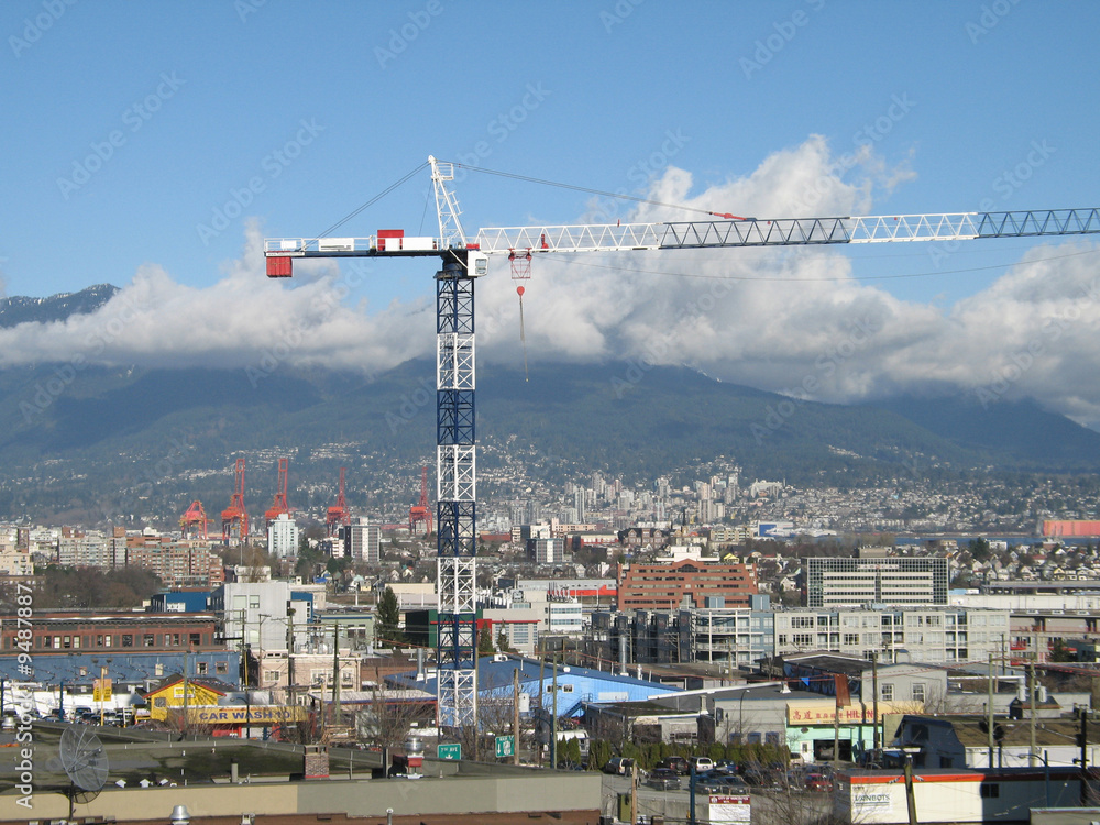 Fototapeta premium blue and white construction crane