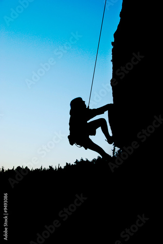 man rock climbing