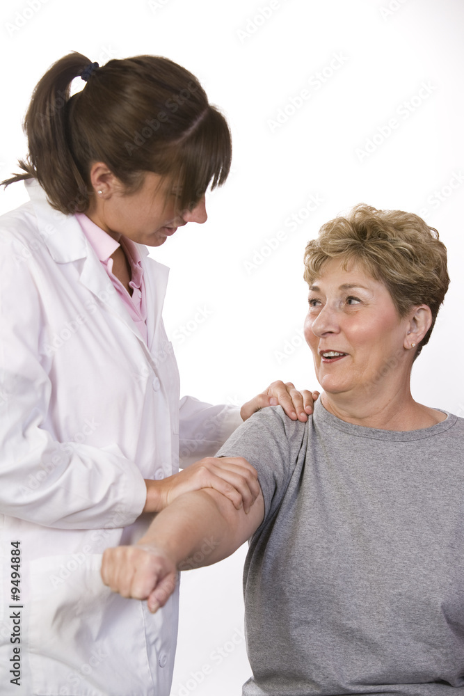 Fototapeta premium physical therapist talks to a patient