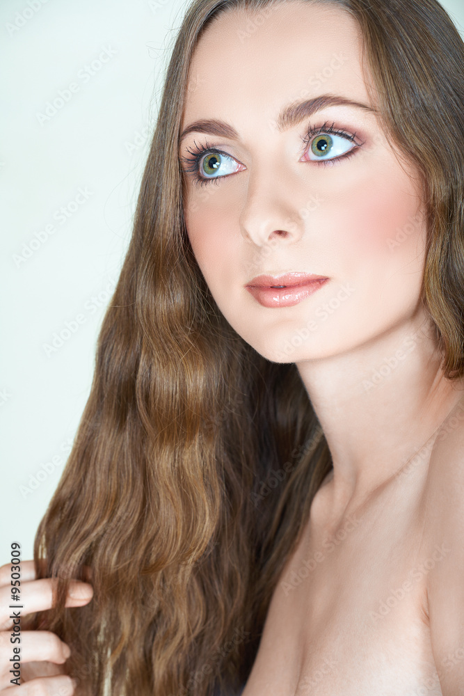 Beautiful brunette girl in early twenties with natural make-up Beautiful brunette girl in early twenties with natural make-up