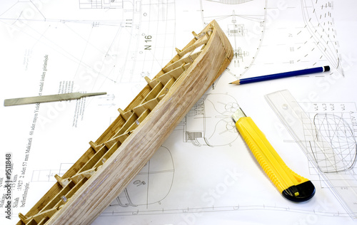 wooden scale model of a ship on plan