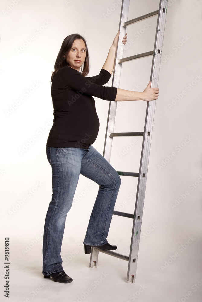 adult pregnant woman climbing on career ladder Stock Photo Adobe Stock