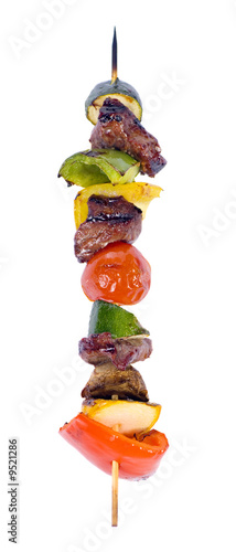 A hot skewer of kabobs right off the barbecue.