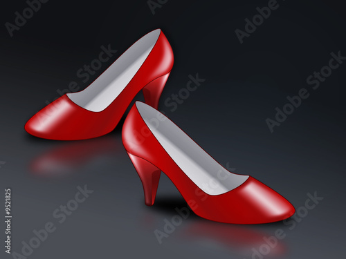 red high-heel shoe on dark background