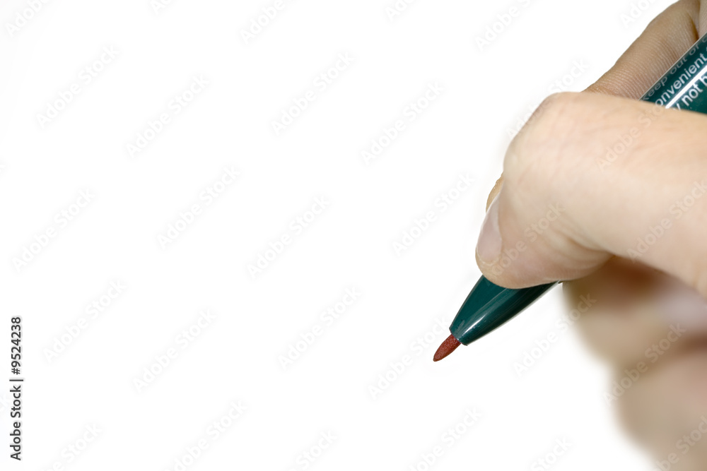A hand with a pen to make a signature A hand with a pen to make a signature