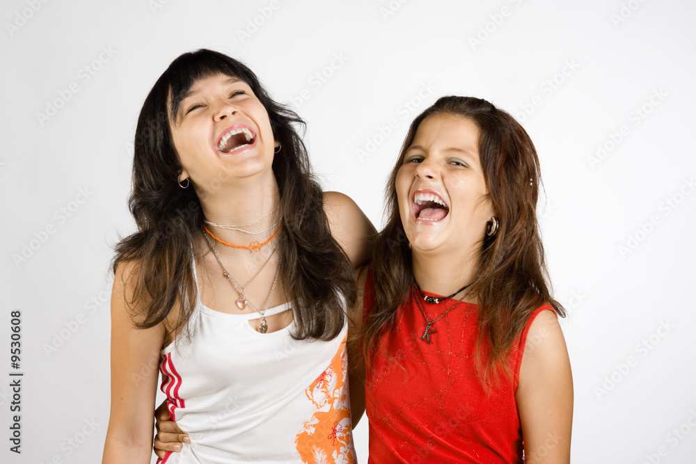 Portrait of two laughing girls