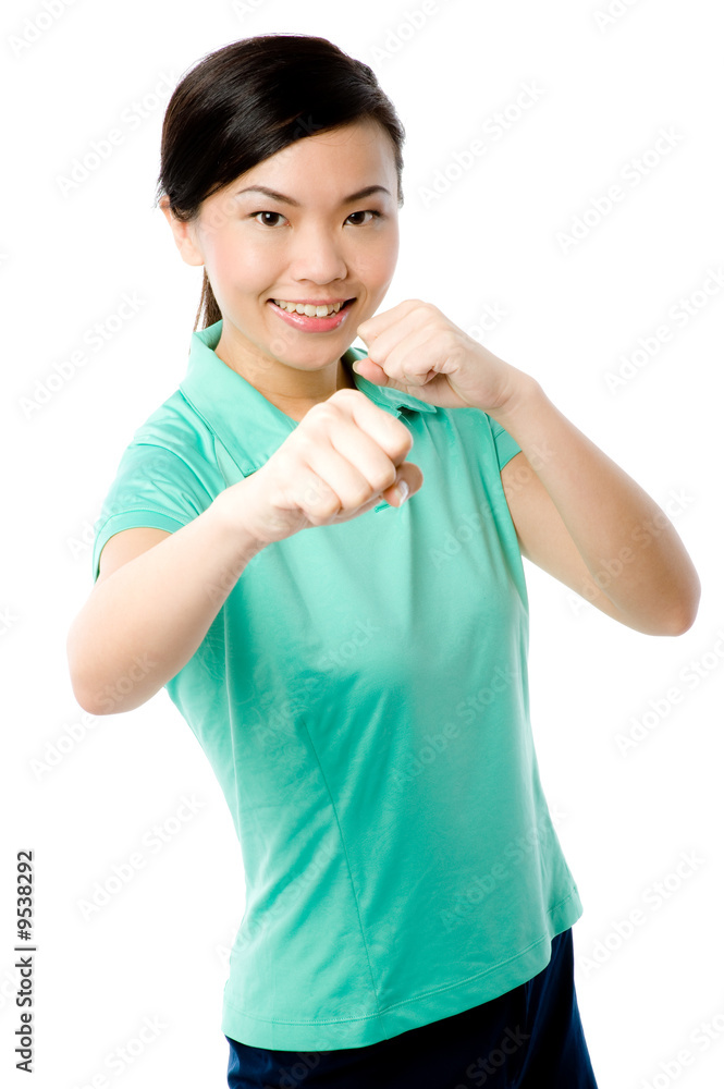 A young attractive Asian woman in green sports top A young attractive Asian woman in green sports top