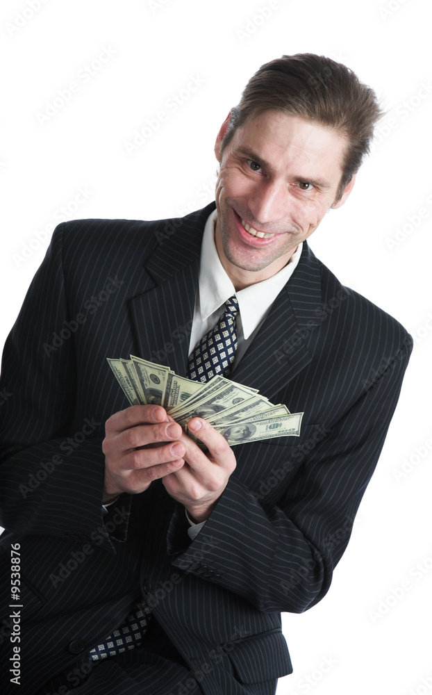 The businessman and dollars on a white background The businessman and dollars on a white background