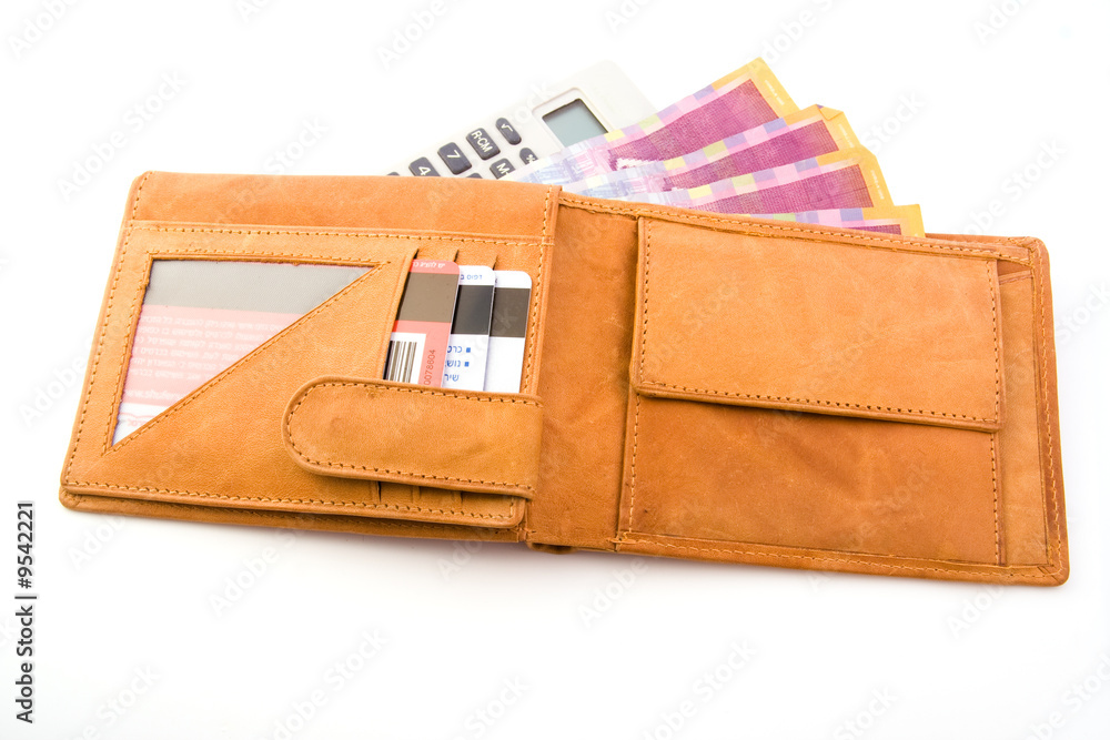 Wallet with money and calculator isolated on white background Wallet with money and calculator isolated on white background