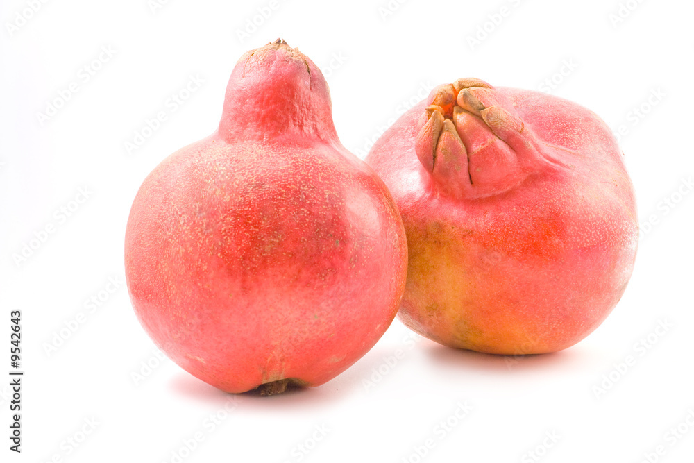Two pomegranates isolated on white background Two pomegranates isolated on white background