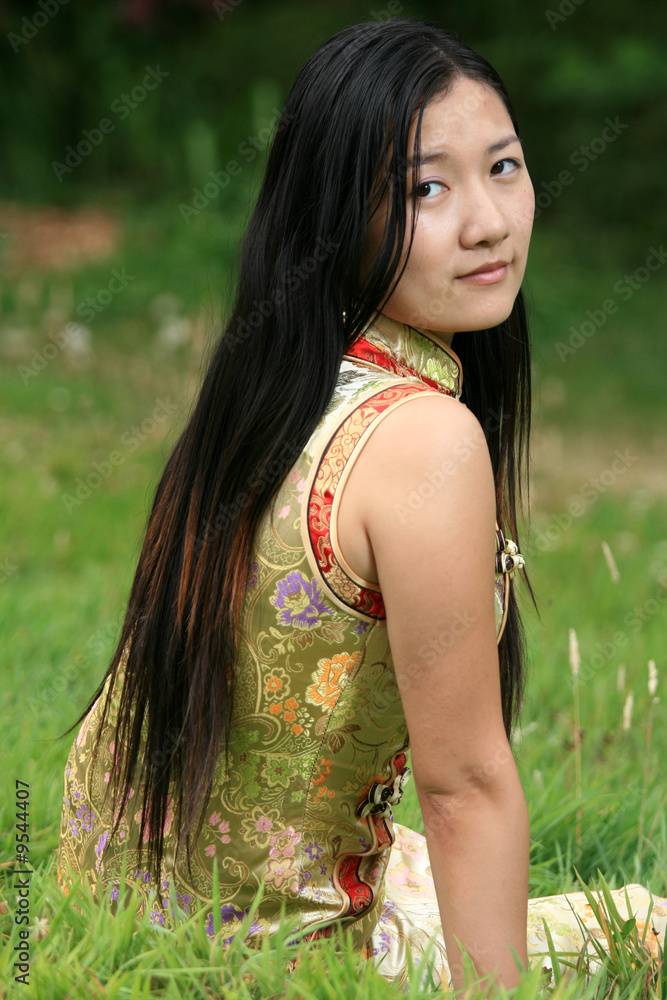 Portrait of Traditional Chinese Girl in an Authentic Dress Portrait of Traditional Chinese Girl in an Authentic Dress
