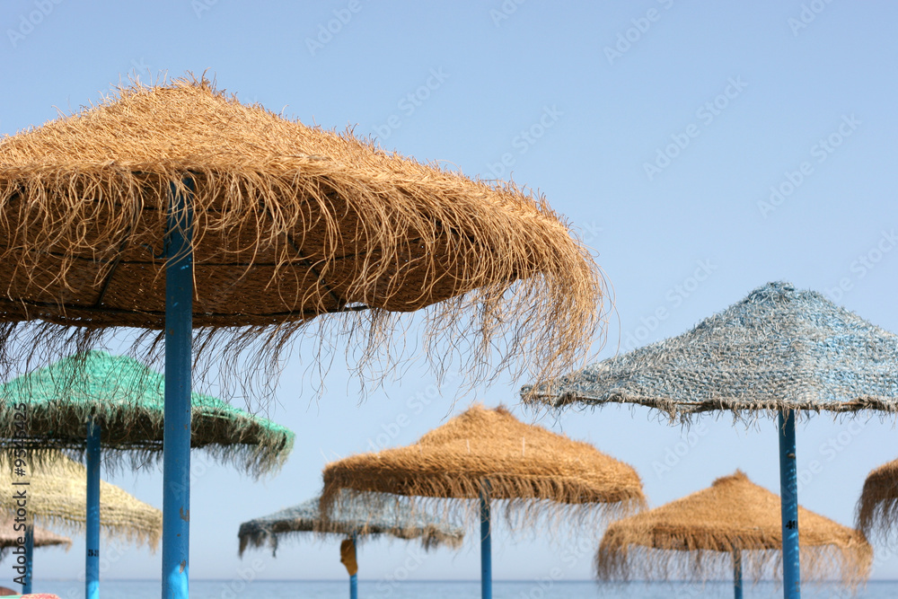 Parasols on a mediterranean beach