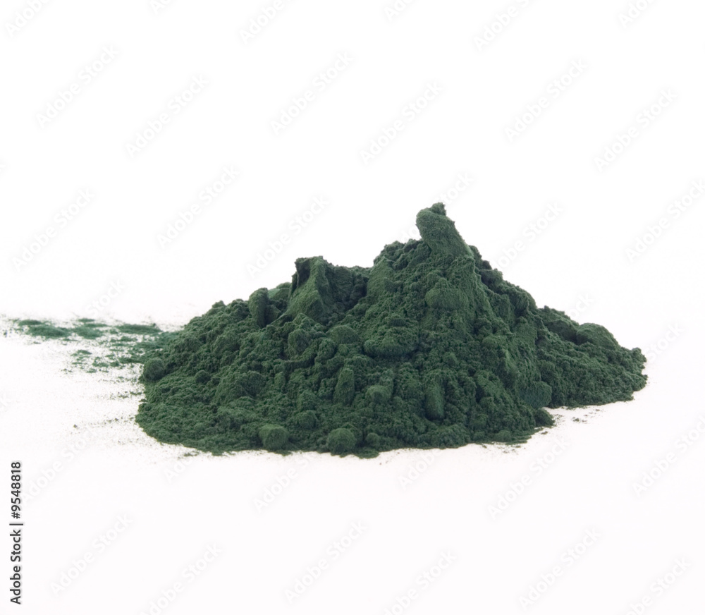 Spirulina powder isolated on white. Spirulina powder isolated on white.