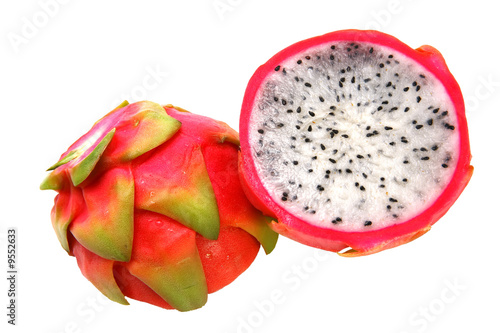 whole and half of dragon fruit over white