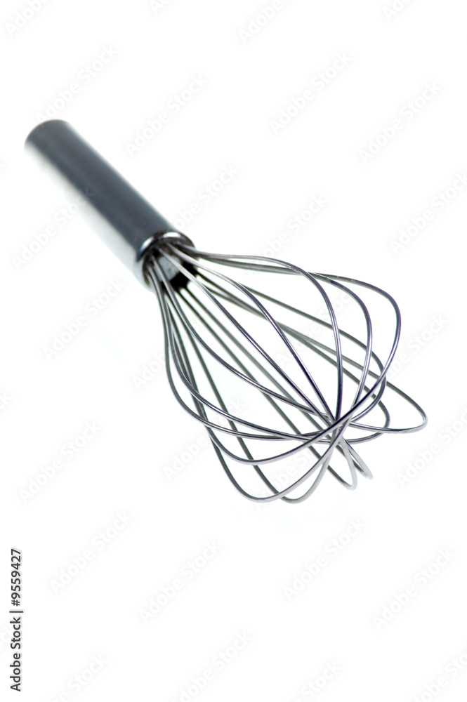 A wire whisk isolated on a white background. A wire whisk isolated on a white background.