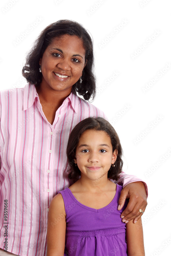 Portrait of a minority woman with daughter on white background Portrait of a minority woman with daughter on white background