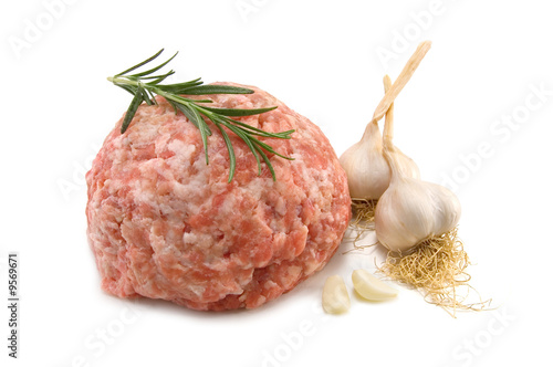 force-meat and garlic isolated on white photo