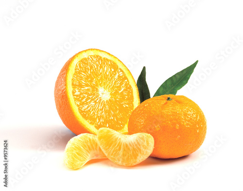 Fototapeta Naklejka Na Ścianę i Meble -  Half orange with mandarin and slices