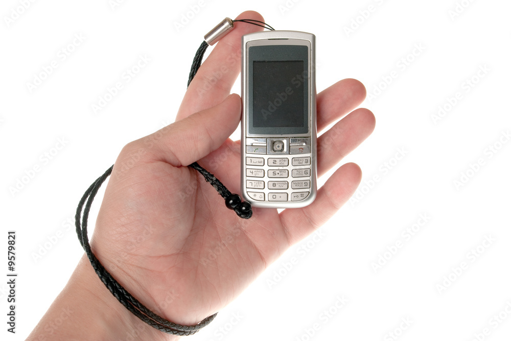 Small Silver Mobile Phone Device in hand Small Silver Mobile Phone Device in hand