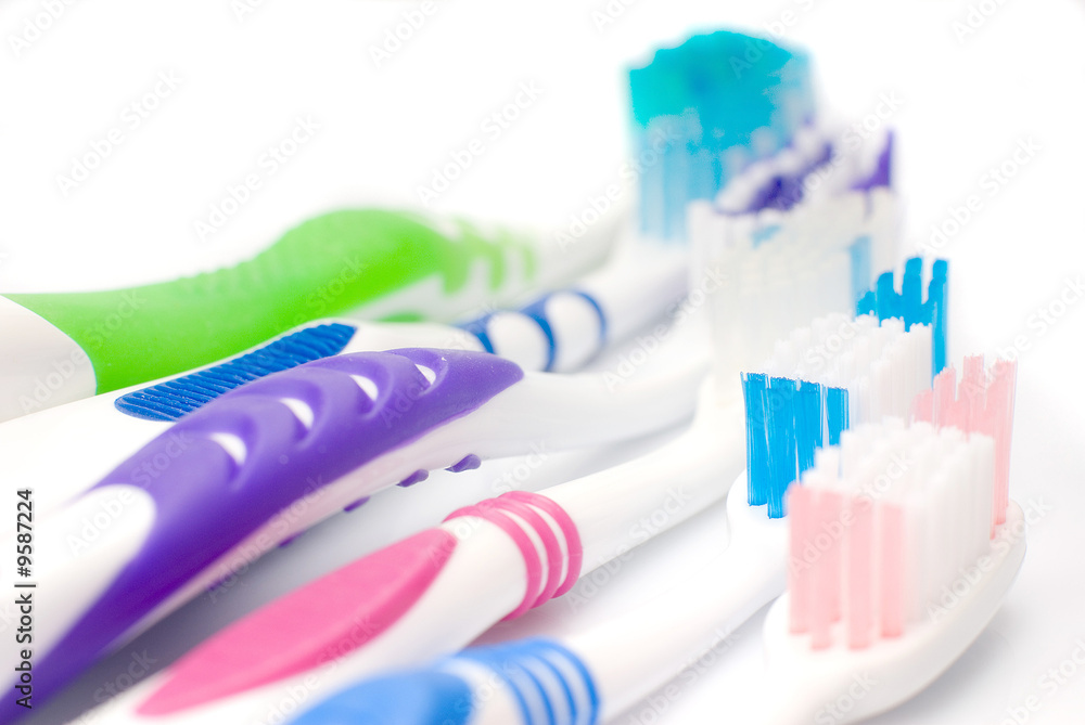 five toothbrushes multicolored five toothbrushes multicolored